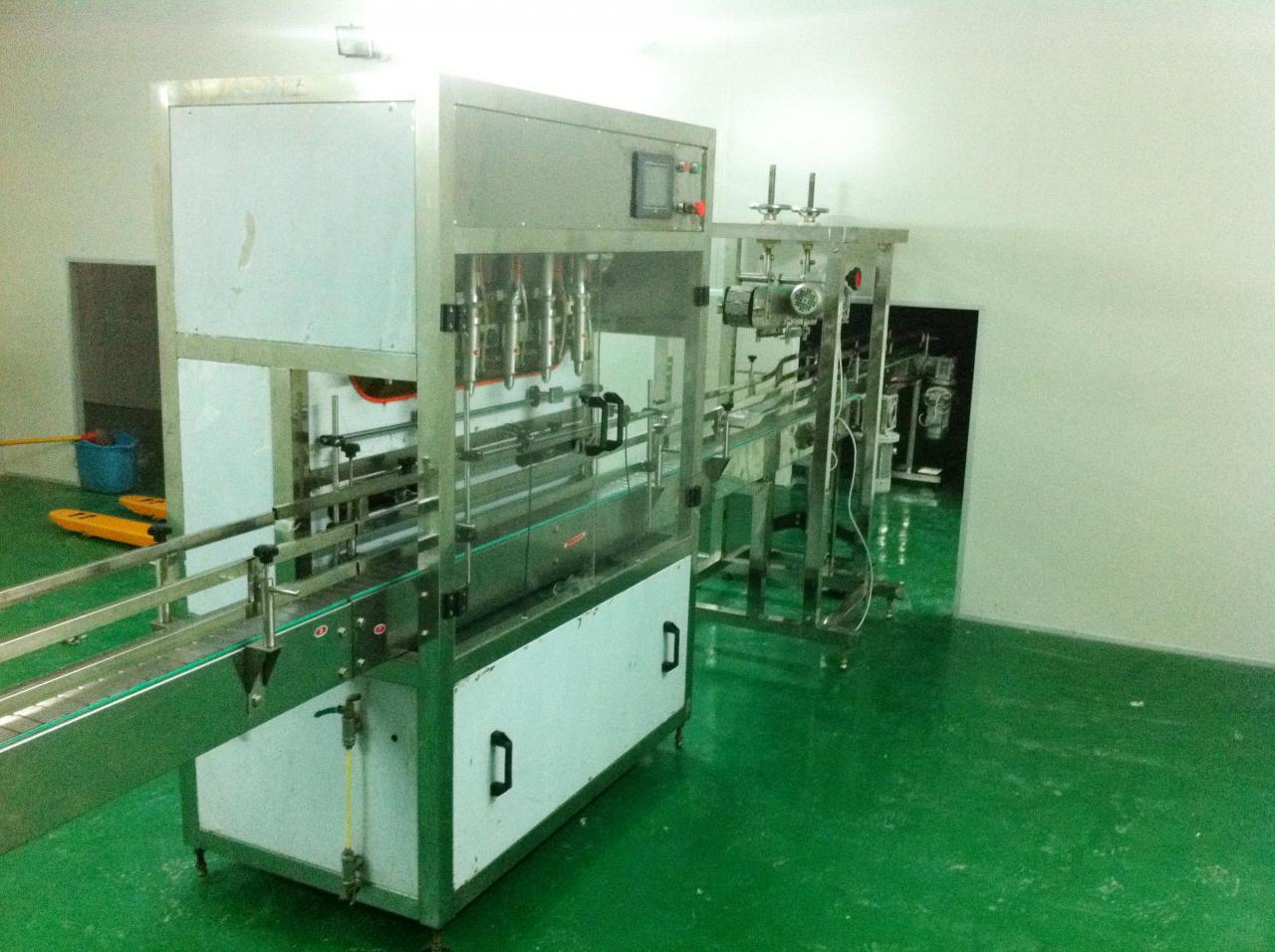 Linear filling machine with 4 filling heads ЛИНЕЙНА ПЪЛНАЧНА МАШИНА.jpg
