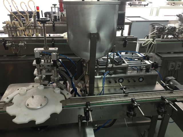 машина за пълнене на два буркана.jpg