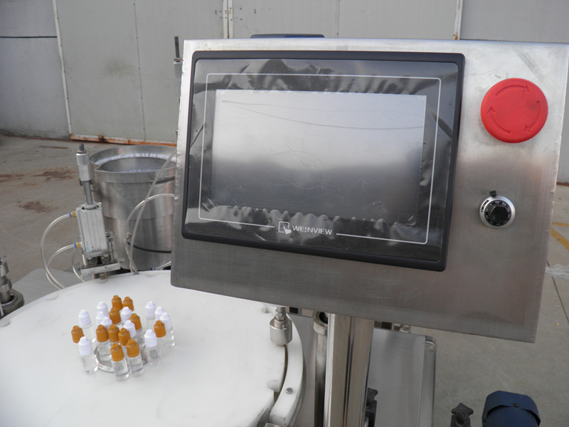 filling plugging capping labeling production line E течен PLC бутилка за пълнене етикетиране.jpg