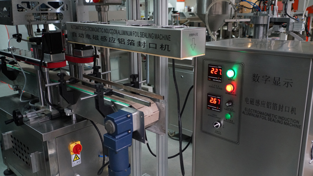 aluminum induction foil sealing machine автоматична машина за запечатване.jpg