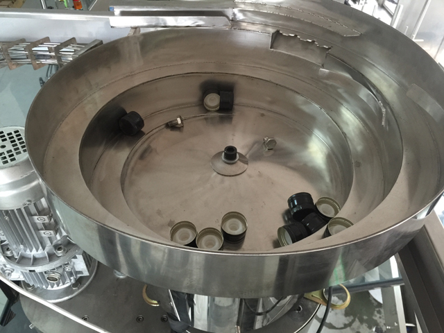 капачки система за подаване на вибратор.jpg