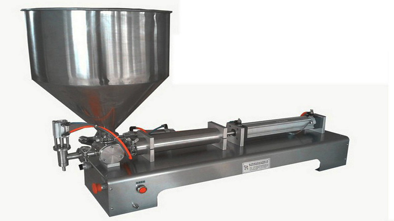 liquid filler semi automatic вертикален бункер за хоризонтална пълначна машина.jpg